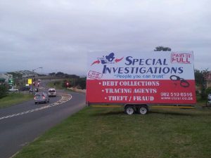 Special Investigation mobile billboard side of the road